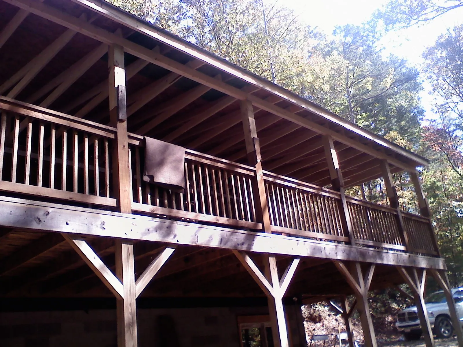 Timber framing under a new elevated porch and deck — Roof Leak Repair in Harrison City by Roofing Brothers